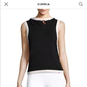 Vimmia. Open back shirt